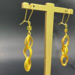 خرید گوشواره ورساچه طلا